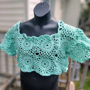 Mint green midriff pullover.